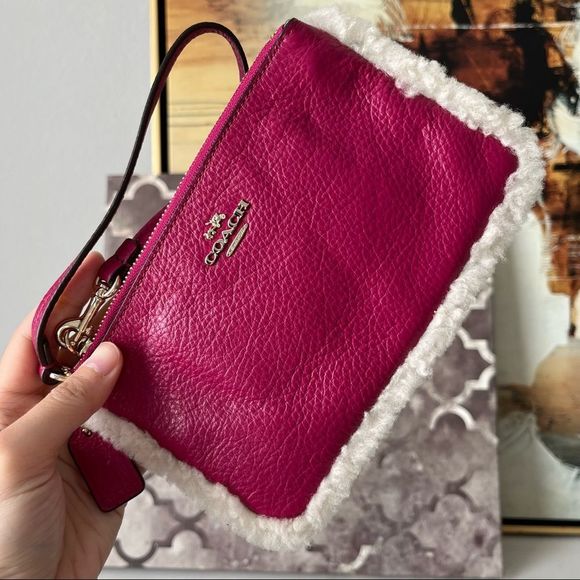 NWOT COACH PINK SMALL WRISTLET IN LEATHER AND SHEARLING (COACH F64709) - Picture 1 of 5